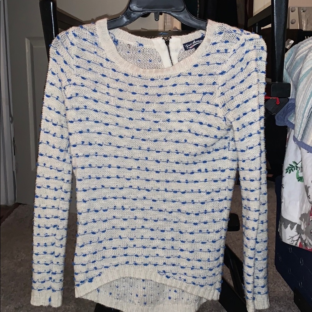 Blue and white sweater